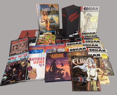 a lot of comic books sitting on a table