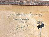 a picture of a piece of art with writing on it