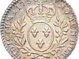 a close up of a coin with a crown on it