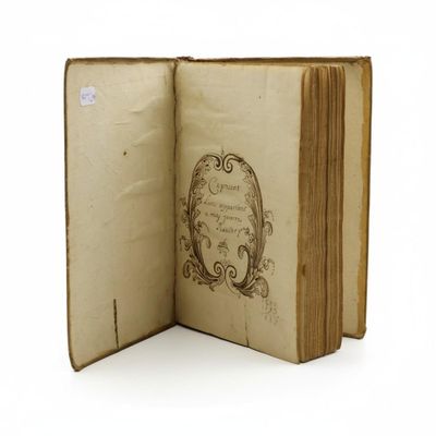 an open book with a drawing on the inside of it