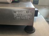 an image of a machine that is on a table
