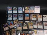a collection of magic the gathering cards on a table