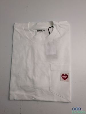 a white t - shirt with a red heart on the chest