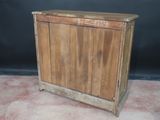 a wooden cabinet with a door on top of it