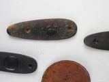several different types of knives are displayed on a white surface