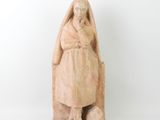 statue of a woman with a dog on a white background