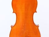an old violin with a wooden back and a long neck