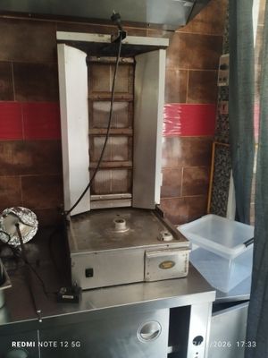 an image of a kitchen with a stove and a sink