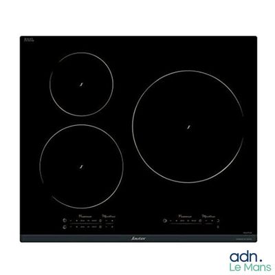gros plan d'une cuisinière noire à trois brûleurs