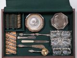 a box with a variety of silverware in it