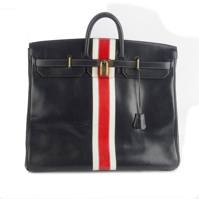 an image of a black leather briefcase with red, white and blue stripes