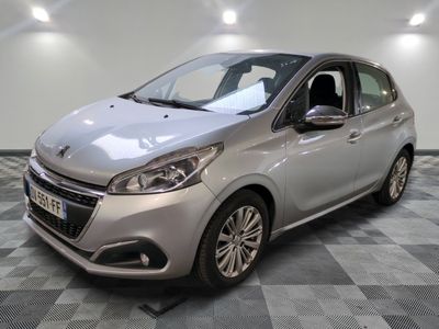 a picture of a silver car on a checkered floor