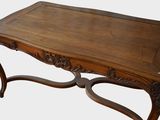 a wooden table with a wooden top on a white background