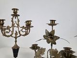 three candles that are sitting on a table