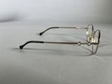 pair of glasses on a table with a white background