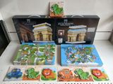 a lot of puzzles on the table in front of each other