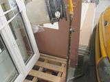 a yellow truck that is parked in a garage