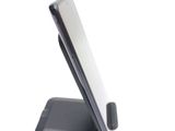 a cell phone that is sitting on a stand