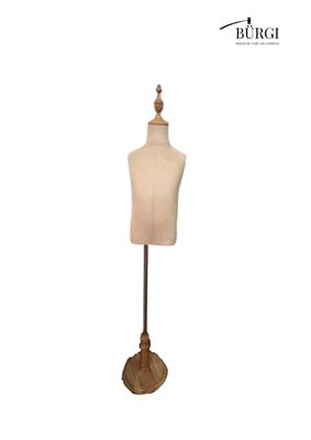 a mannequin on a wooden stand with a white background