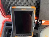 a tablet computer sitting in a case on a table