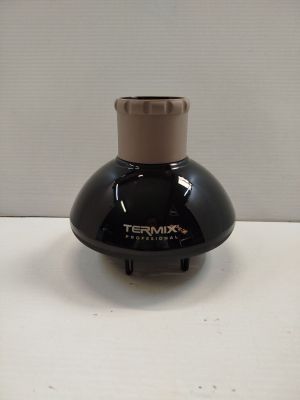 a small black vase with a brown top on a table