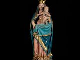 an image of a statue of a woman holding a child