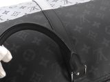 an image of a black and white louis vuitton bag