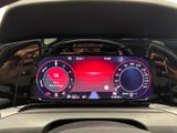 the dashboard of a car with a digital display in the center