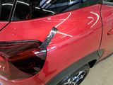 a close up of a car ' s tail light and tail light