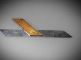 two pieces of metal and wood on a gray surface
