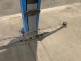 a parking meter on the side of the street