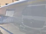 a bus that is parked on the side of the road