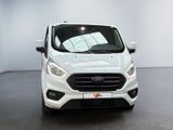 a white ford transit van parked in a white room