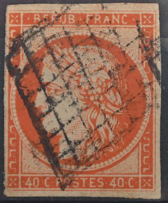 un timbre orange et noir sur lequel figure l'image d'une femme