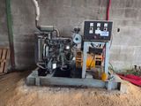 a machine that is sitting in the middle of a dirt area
