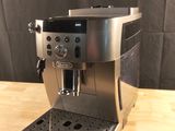 an image of a coffee machine on a wooden table