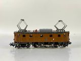 a toy train that is sitting on a white surface