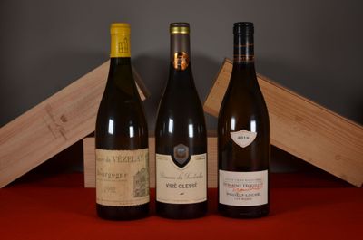 three bottles of wine sitting next to each other on a table
