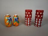 three vases sitting next to each other on a table