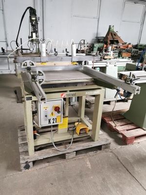 a picture of a machine shop with many machines in it