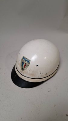 a white helmet that is sitting on a table