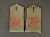 two tags with the numbers thirteen and thirteen on them