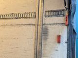 a man that is riding a skateboard in a garage