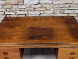 an old wooden desk with drawers and drawers on top of it