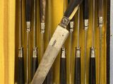 a case with a knife and a set of knives in it