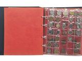 a close up of a book with a bunch of coins in it
