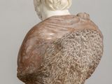 marble bust of a man with a beard on a pedestal