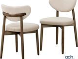 two chairs that are sitting next to each other on a white background