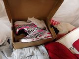a box with a pair of shoes inside of it