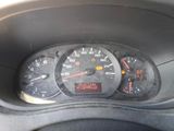 a close up of a speedometer in a car